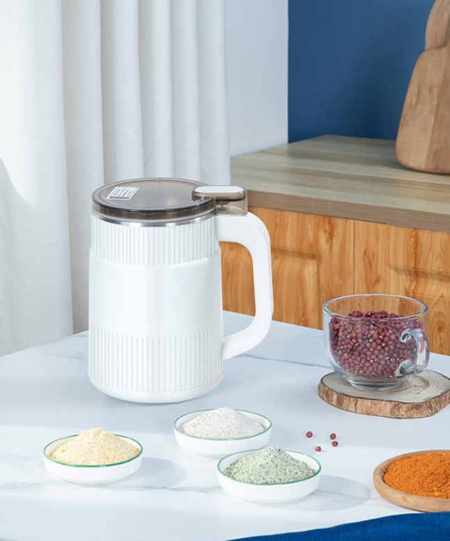 "Leistungsstarke Getreidemühle aus Edelstahl, mahlt Körner zu feinem Mehl, mit modernem Design, ideal für die Küche."