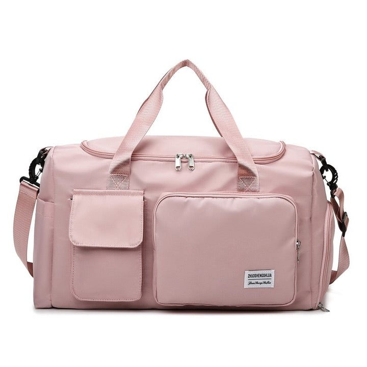 "Lila Damen-Reisetasche mit Schuhfach und mehreren Taschen, ideal für Reisen und Sport, robust und wasserdicht."