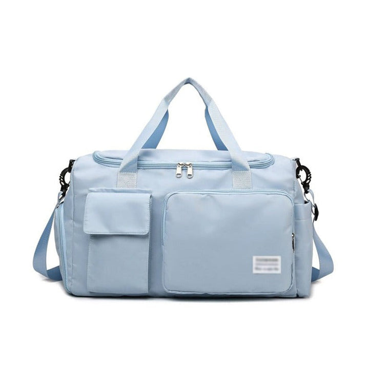 "Lila Damen-Reisetasche mit Schuhfach und mehreren Taschen, ideal für Reisen und Sport, robust und wasserdicht."