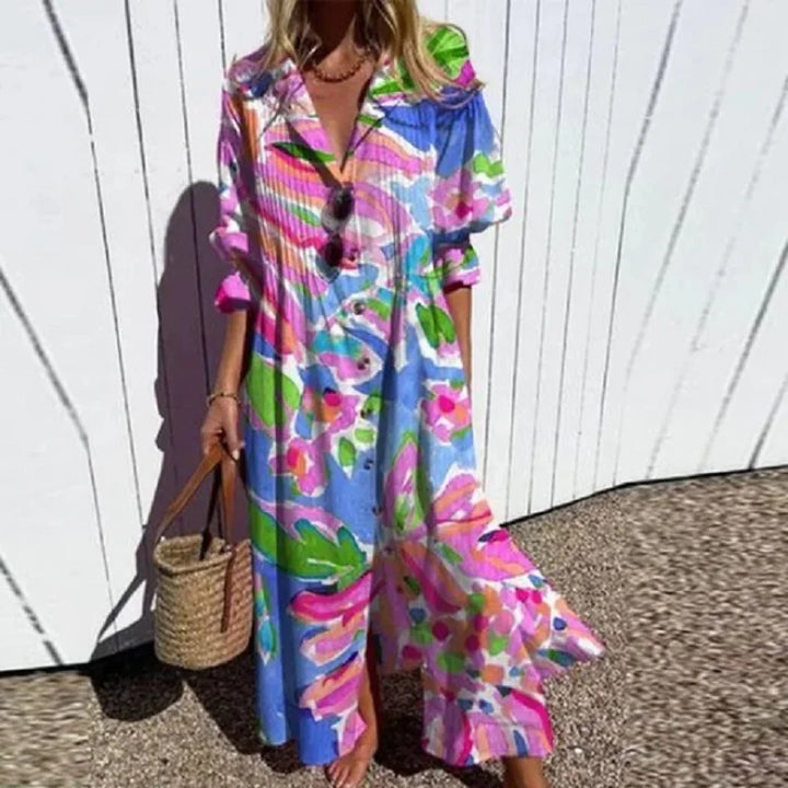 "Luftiges Boho-Maxikleid mit V-Ausschnitt, bunte Muster, ideal für Sommer, vielseitig und bequem für jeden Anlass."