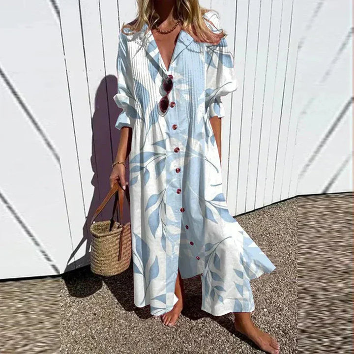 "Luftiges Boho-Maxikleid mit V-Ausschnitt, bunte Muster, ideal für Sommer, vielseitig und bequem für jeden Anlass."