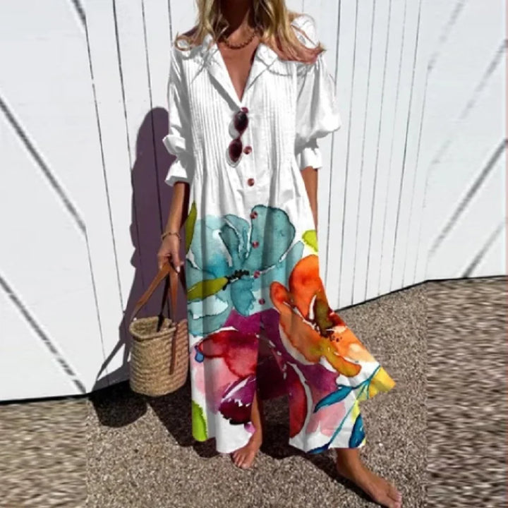"Luftiges Boho-Maxikleid mit V-Ausschnitt, bunte Muster, ideal für Sommer, vielseitig und bequem für jeden Anlass."