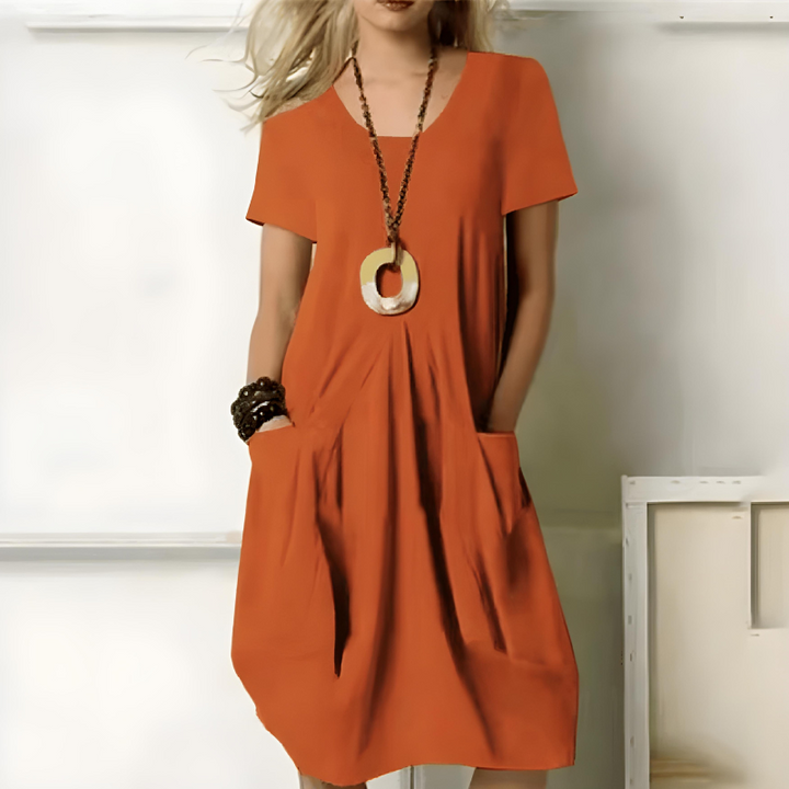 Luftiges Damen-Midi-Sommerkleid, locker geschnitten, Rundhalsausschnitt, fließend, Seitentaschen, ideal für warme Tage.