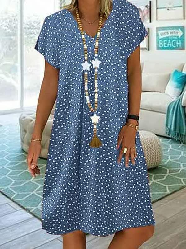 "Luftiges Damen-Sommerkleid mit buntem Muster, ideal für heiße Tage. Leichtes Material sorgt für Komfort und Eleganz."