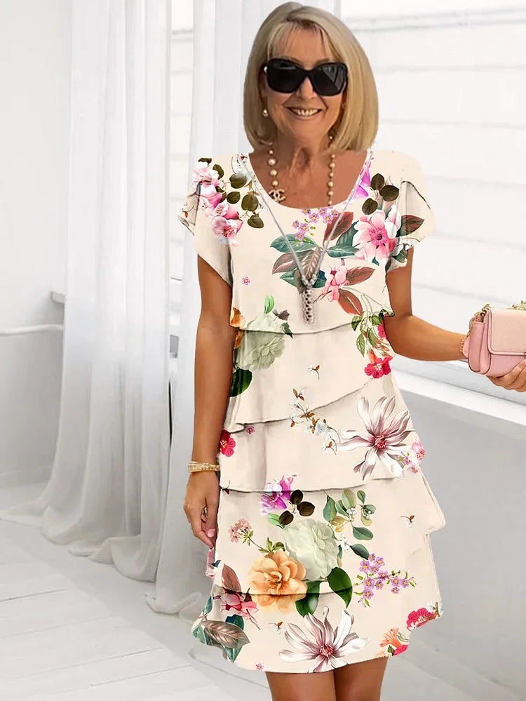 Luftiges Damen Sommerkleid mit floralem Muster, elegante Silhouette, leichte Baumwolle, perfekt für warme Tage.