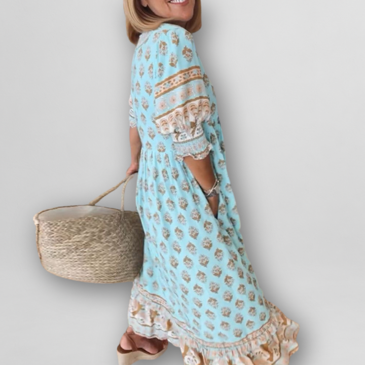 "Luftiges Sommerkleid mit floralem Muster, Altrosa/Hellblau, lockerer Schnitt, L-3XL, ideal für warme Tage."