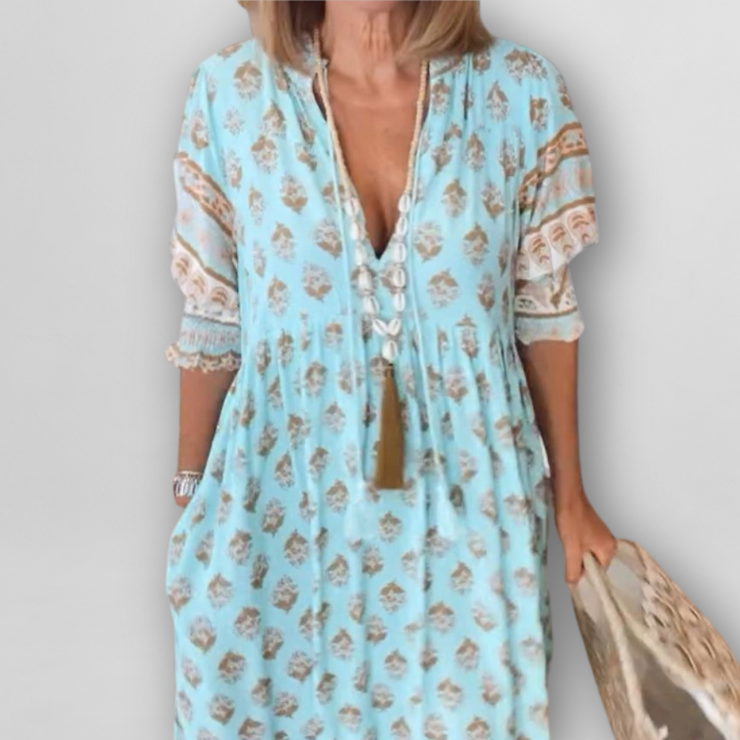 "Luftiges Sommerkleid mit floralem Muster, Altrosa/Hellblau, lockerer Schnitt, L-3XL, ideal für warme Tage."