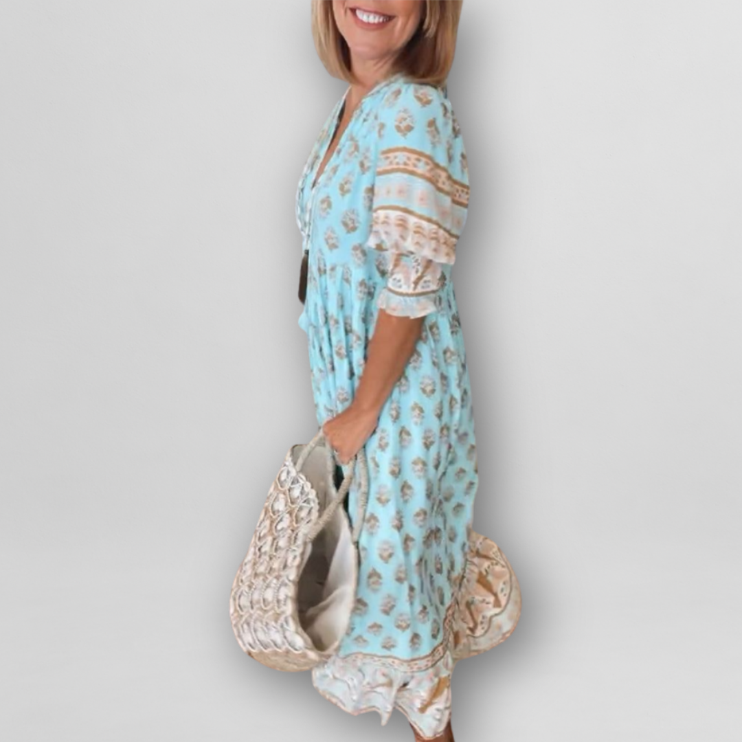 "Luftiges Sommerkleid mit floralem Muster, Altrosa/Hellblau, lockerer Schnitt, L-3XL, ideal für warme Tage."