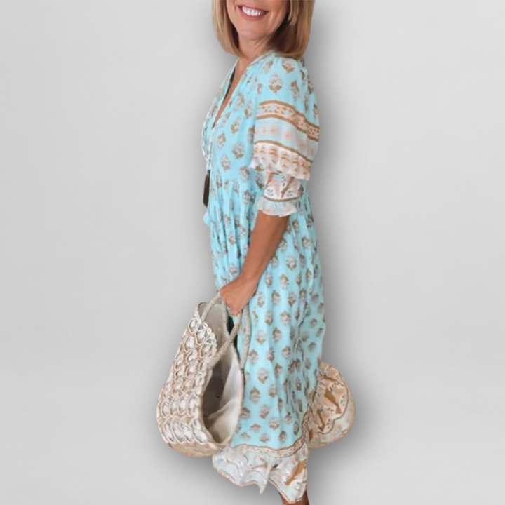 "Luftiges Sommerkleid mit floralem Muster, Altrosa/Hellblau, lockerer Schnitt, L-3XL, ideal für warme Tage."