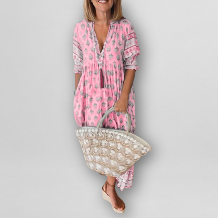 "Luftiges Sommerkleid mit floralem Muster, Altrosa/Hellblau, lockerer Schnitt, L-3XL, ideal für warme Tage."