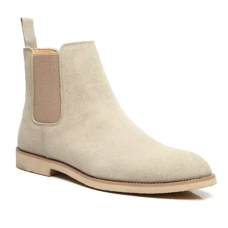 Luxuriöse Chelsea-Stiefel aus weichem Kalbswildleder mit elastischen Einsätzen, elegante Optik, ideal für Damenoutfits.