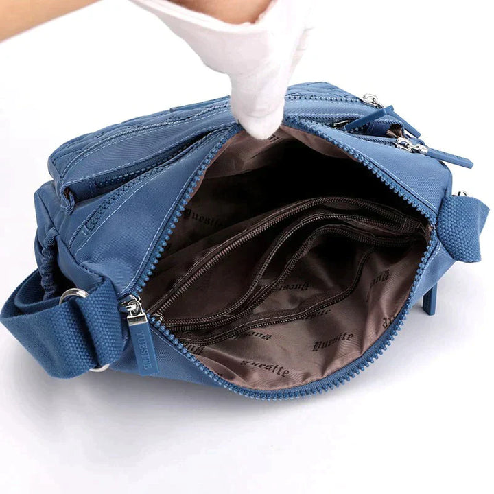 Luxuriöse Damen Umhängetasche in Schwarz mit verstellbarem Gurt, mehreren Fächern, ideal für Alltag und besondere Anlässe.
