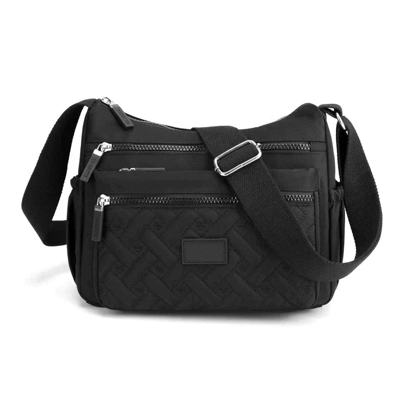 Luxuriöse Damen Umhängetasche in Schwarz mit verstellbarem Gurt, mehreren Fächern, ideal für Alltag und besondere Anlässe.