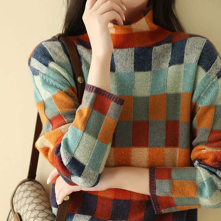 "Luxuriöser 100% Kaschmirpullover für Damen in elegantem Design und sanften Farben mit hohem Kragen für stilvolle Anlässe."