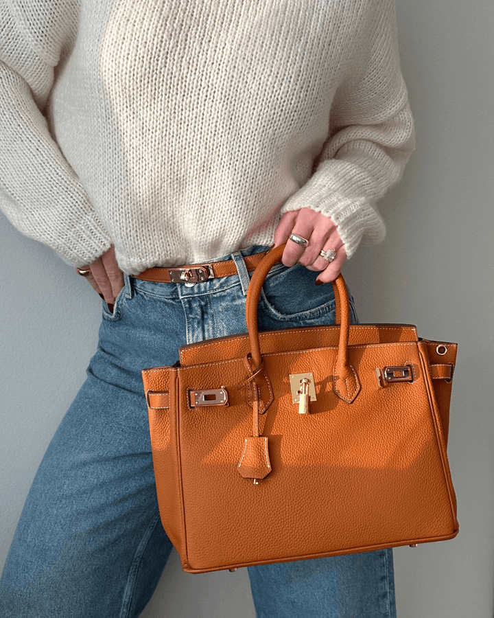 Luxus Lederhandtasche für Damen in Schwarz, elegantes Design, geräumig mit Fächern, abnehmbarer Schulterriemen.