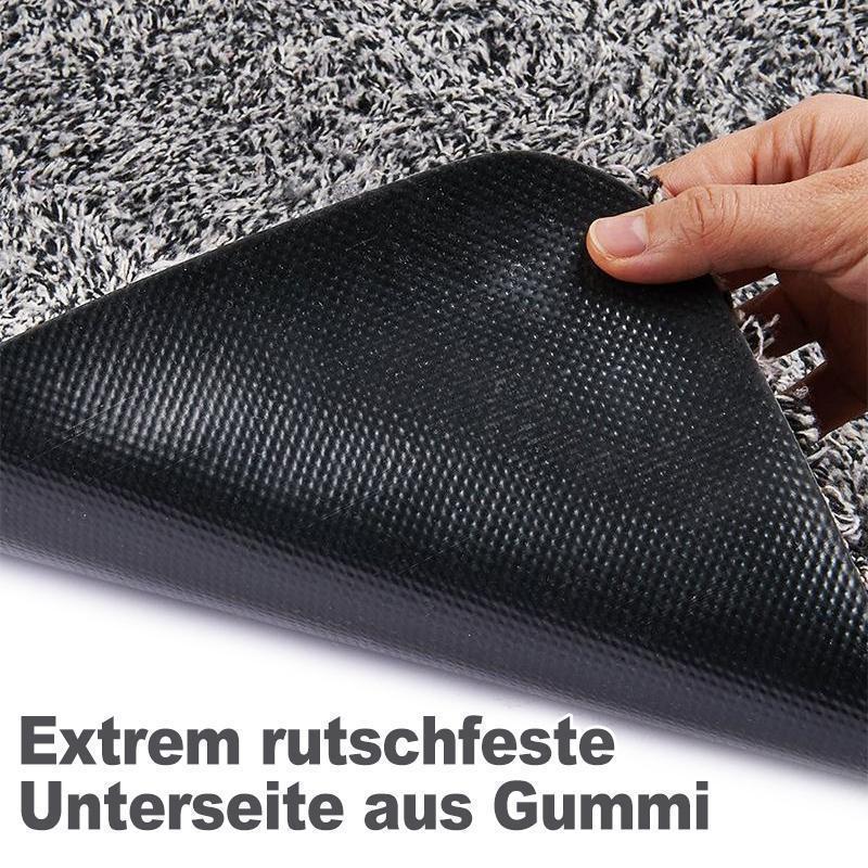"Magische dunkelgraue Schmutzfangmatte, ultra saugfähig, rutschfest, in 70x45 cm Größe, für Eingangsbereich."