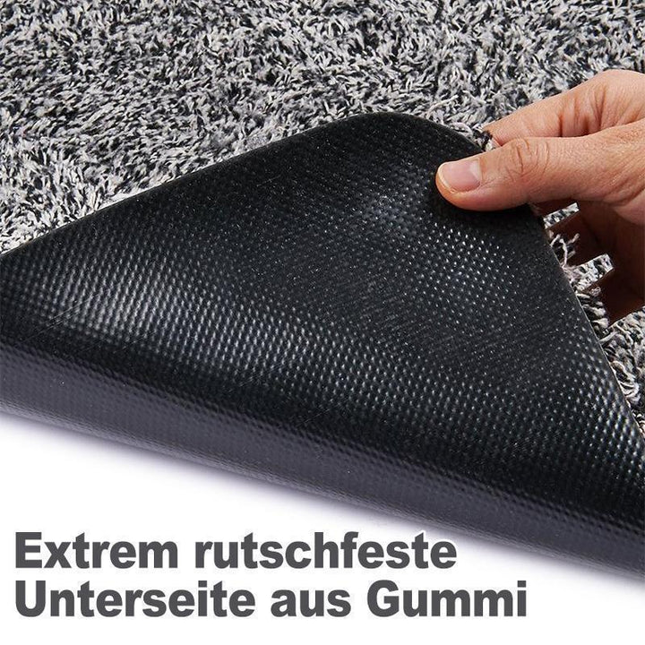 "Magische dunkelgraue Schmutzfangmatte, ultra saugfähig, rutschfest, in 70x45 cm Größe, für Eingangsbereich."