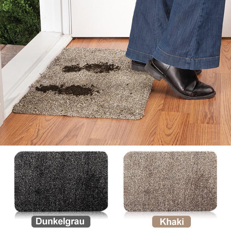 "Magische dunkelgraue Schmutzfangmatte, ultra saugfähig, rutschfest, in 70x45 cm Größe, für Eingangsbereich."
