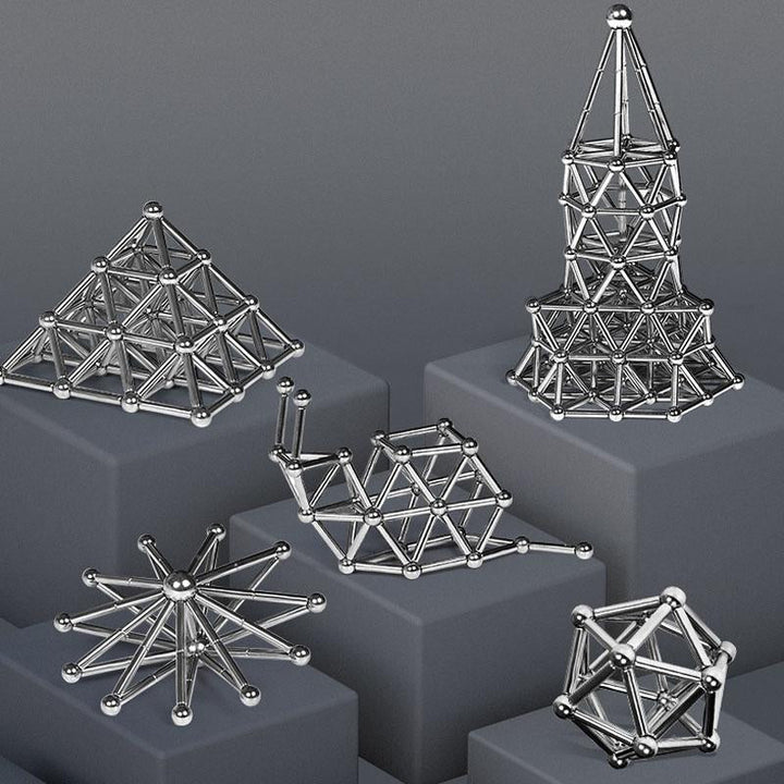 "Magnetische Kugeln und Stäbe in Silber, glänzend, perfekt zum kreativen Gestalten und Stressabbau, aus robusten Materialien.