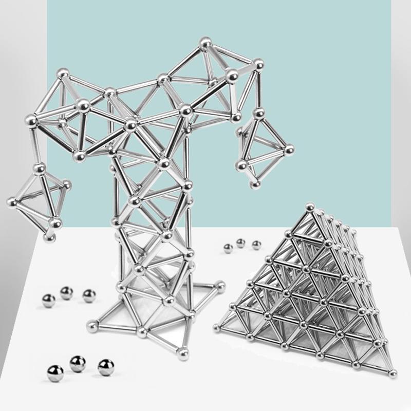 "Magnetische Kugeln und Stäbe in Silber, glänzend, perfekt zum kreativen Gestalten und Stressabbau, aus robusten Materialien.