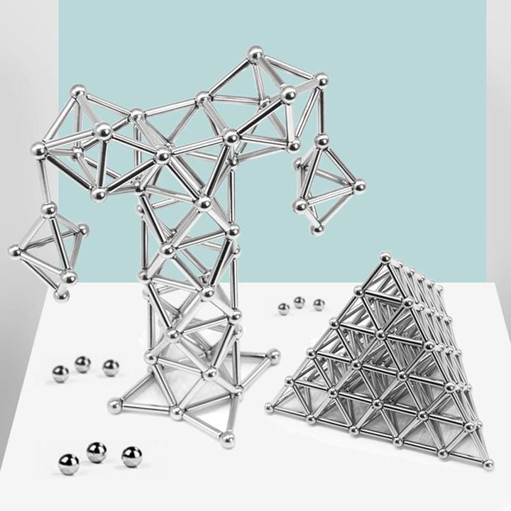 "Magnetische Kugeln und Stäbe in Silber, glänzend, perfekt zum kreativen Gestalten und Stressabbau, aus robusten Materialien.