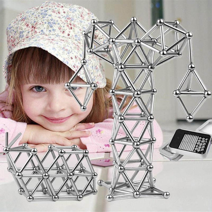 "Magnetische Kugeln und Stäbe in Silber, glänzend, perfekt zum kreativen Gestalten und Stressabbau, aus robusten Materialien.