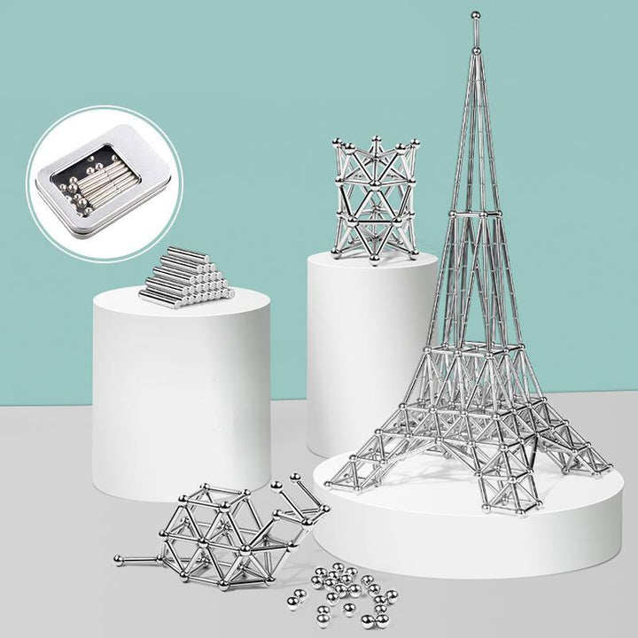"Magnetische Kugeln und Stäbe in Silber, glänzend, perfekt zum kreativen Gestalten und Stressabbau, aus robusten Materialien.