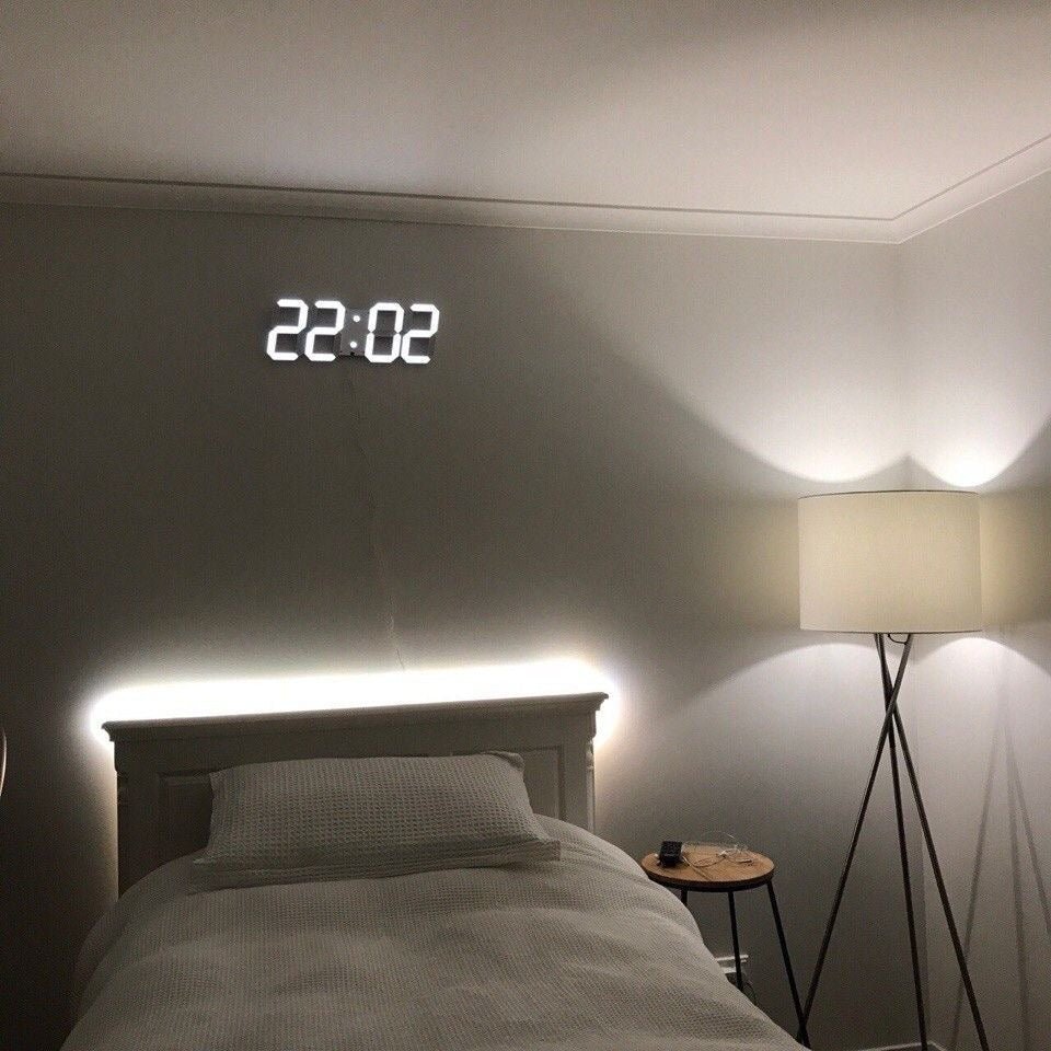 "Moderne 3D LED Wanduhr, dimmbar, minimalistisches Design, vielseitig für Wohnzimmer, Büro und Schlafzimmer einsetzbar"