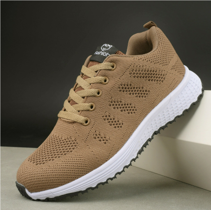"Moderne atmungsaktive Damen-Sneaker, ideal für Freizeit und Sport, mit sicherem Schnürverschluss in Weißgrau."
