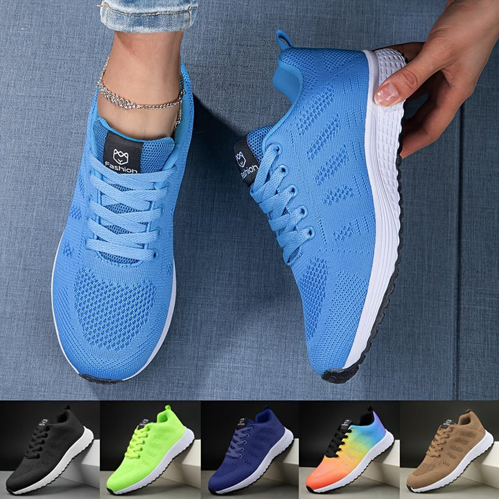 "Moderne atmungsaktive Damen-Sneaker, ideal für Freizeit und Sport, mit sicherem Schnürverschluss in Weißgrau."