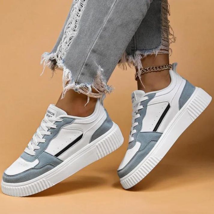 "Moderne Damen-Turnschuhe in frischen Farben, gepolsterte Sohle, elegantes Design, ideal für langen Komfort."