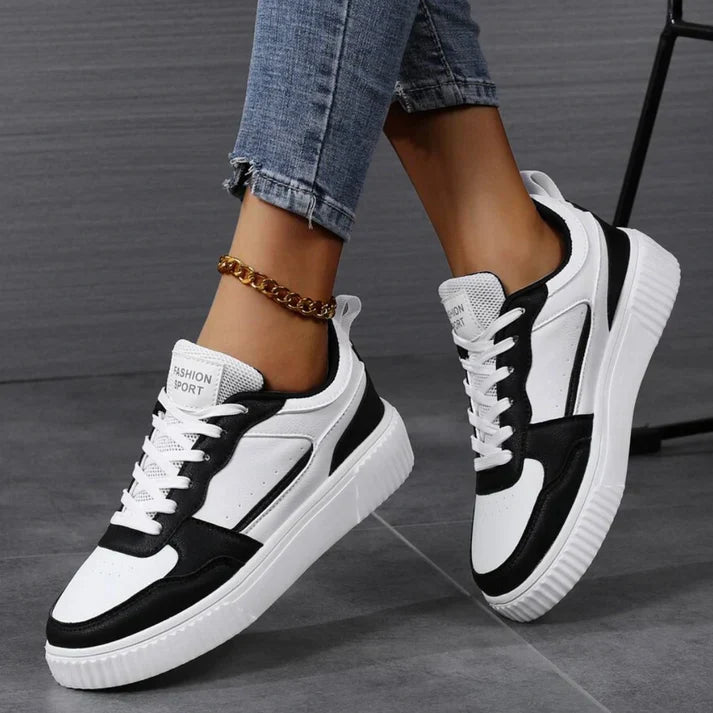 "Moderne Damen-Turnschuhe in frischen Farben, gepolsterte Sohle, elegantes Design, ideal für langen Komfort."