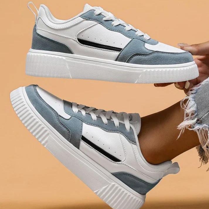 "Moderne Damen-Turnschuhe in frischen Farben, gepolsterte Sohle, elegantes Design, ideal für langen Komfort."