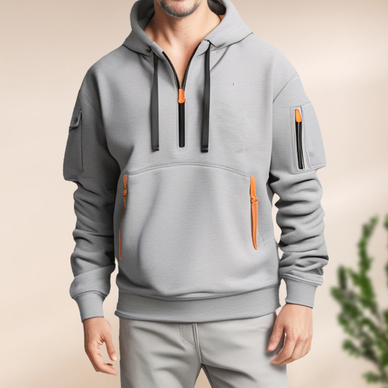 "Moderner Adriano Hoodie mit halbem Reißverschluss, minimalistisch, grau, weich, atmungsaktiv, stilvoll und flexibel."