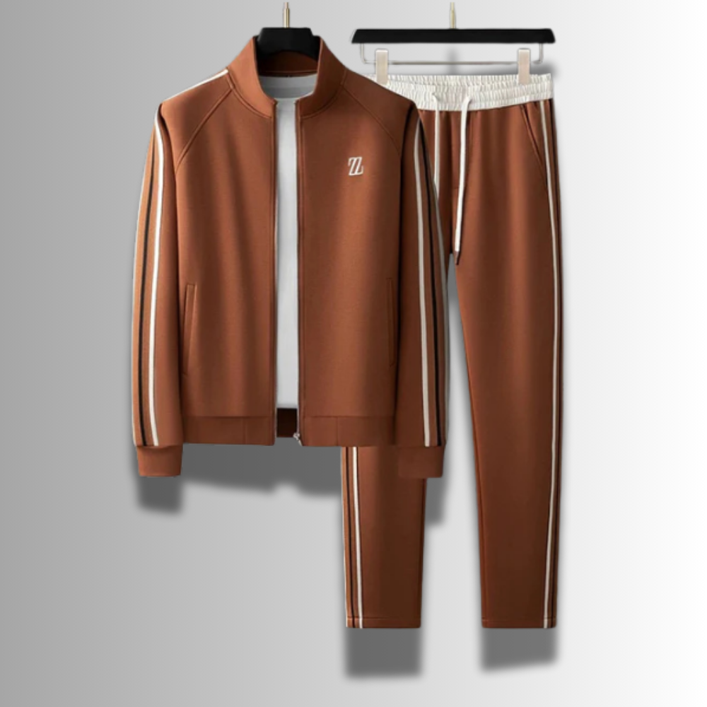 Moderner Herren Jogginganzug, atmungsaktiv, in Grau mit Kapuze und Taschen, ideal für Sport und Freizeit.