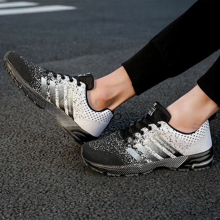 Moderner Herren Laufschuh in verschiedenen Farben, leicht, atmungsaktiv mit stoßdämpfender Sohle und robuster Traktion.