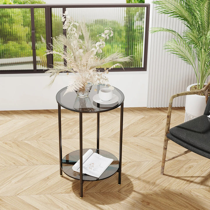 "Moderner runder Kaffeetisch aus gehärtetem Glas mit schwarzem Metallrahmen, 2 Ebenen, ideal fürs Wohnzimmer."