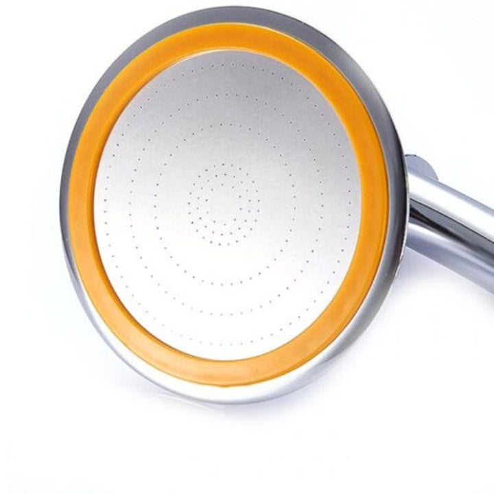 "Moderner runder Regendusche Duschkopf in Silber und Orange, 360-Grad drehbar für luxuriöses Duscherlebnis."
