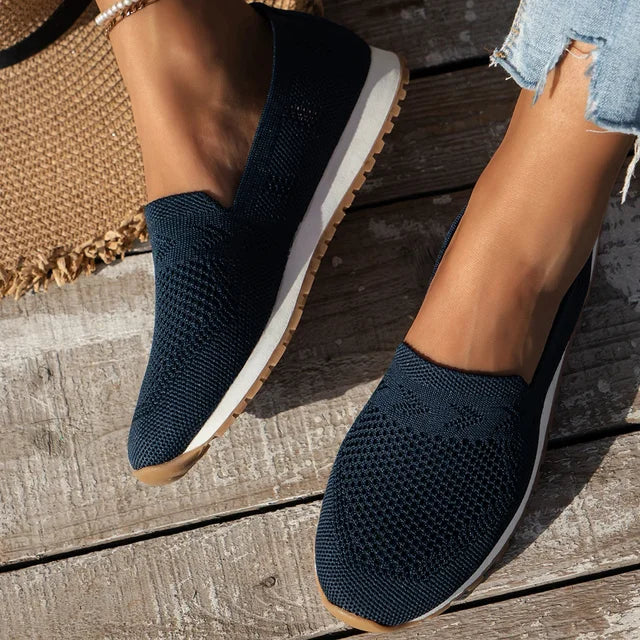 "Orthopädische Damen-Schuhe, schwarz, moderner Slip-On-Stil, ergonomische Sohle, runde Spitze, Komfort und Atmungsaktivität"