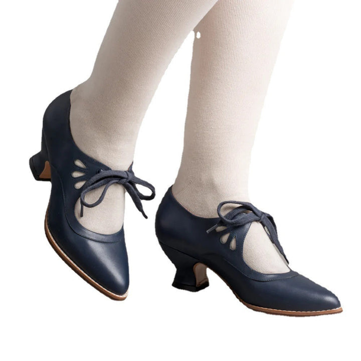 Orthopädische Damenschuhe, elegant, hoher Absatz, modernes Design, schwarz, rutschfeste Sohle für Komfort und Stabilität.