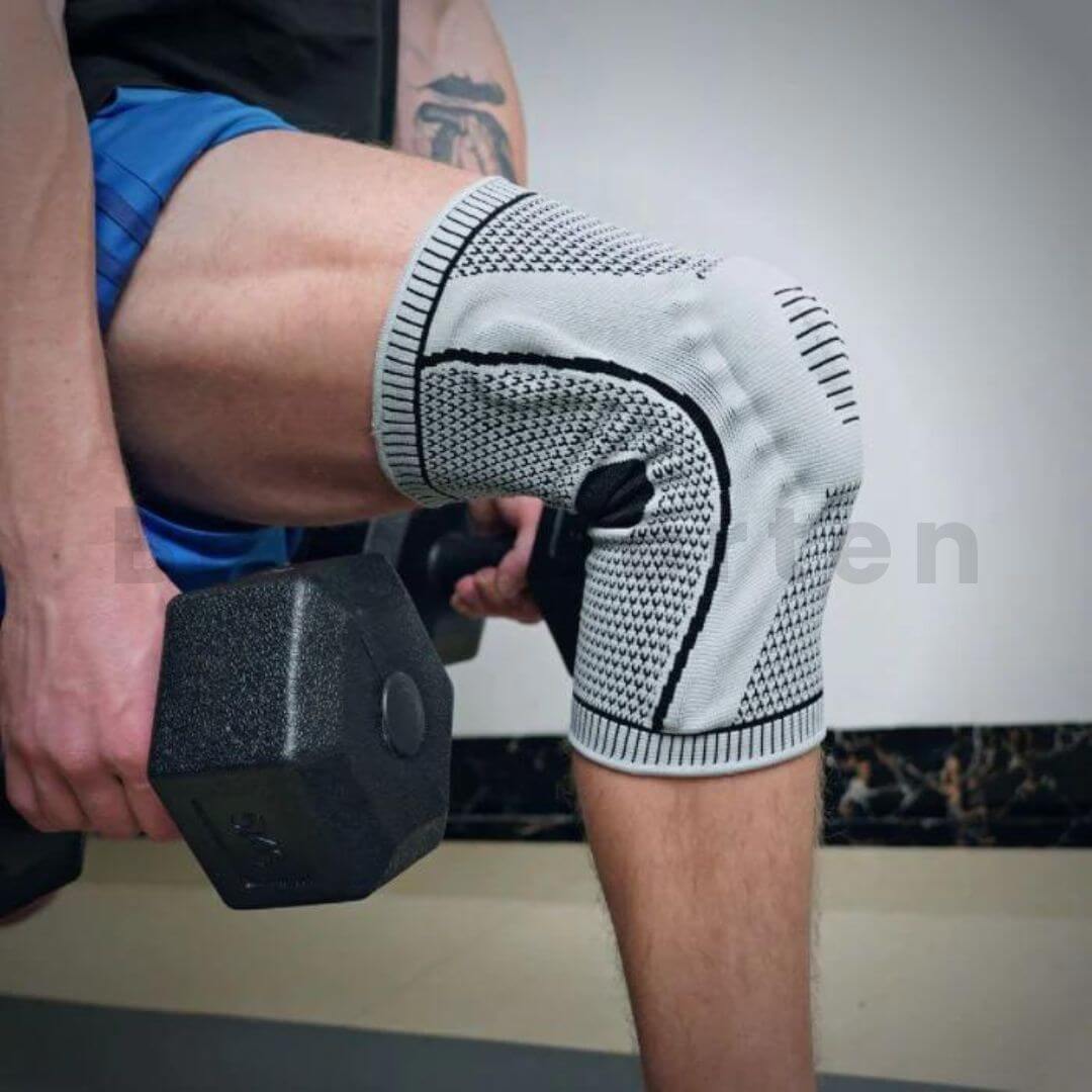 "Orthopädische Kompressions-Kniestütze; schwarz mit blauem Design, bietet Gelenkunterstützung und Entlastung bei Kniebeschwer
