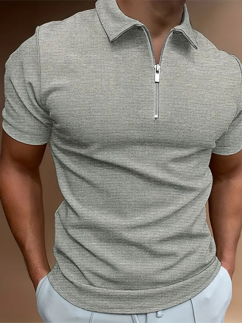 "Polo-Shirt mit Reißverschluss für Herren, stilvoller Reverskragen, aus Baumwollmischung, ideal für Sommeraktivitäten."