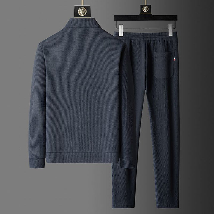 "Premium-Trainingsanzug für Männer, sportlich-elegant, aus flexibler Lycra, robust, schwarz mit detaillierten Nähten"