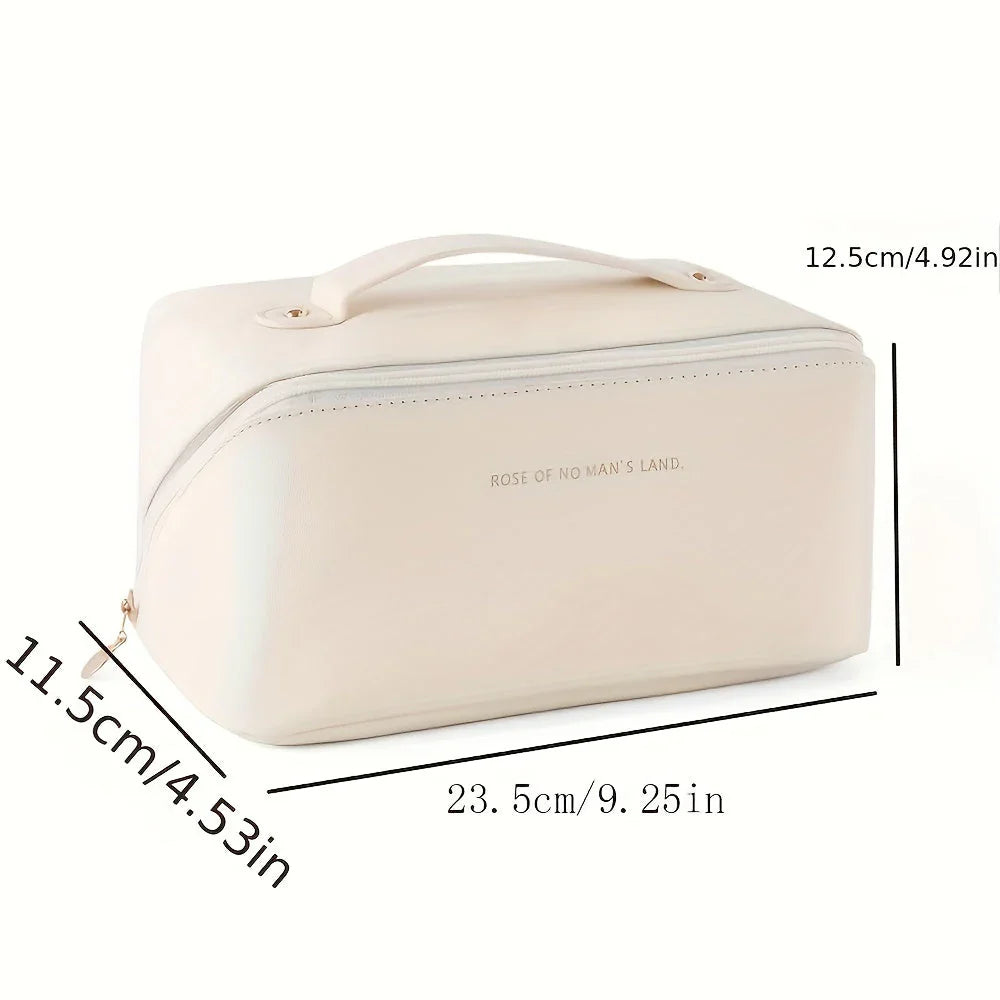 "Reisefreundliche Kosmetiktasche in Rosa, kompakt & elegant, mit praktischem Griff & vielseitiger Innenaufteilung"