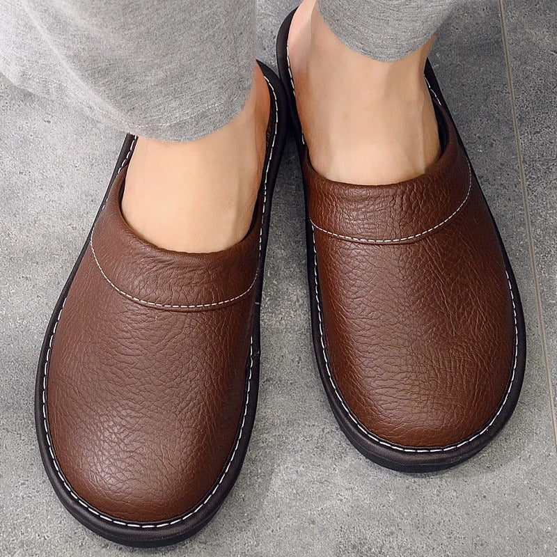 Robuste Lederpantoffeln für Damen und Herren, elegant und langlebig, in Blau, Braun, Orange, Rosa, Rot und Schwarz.