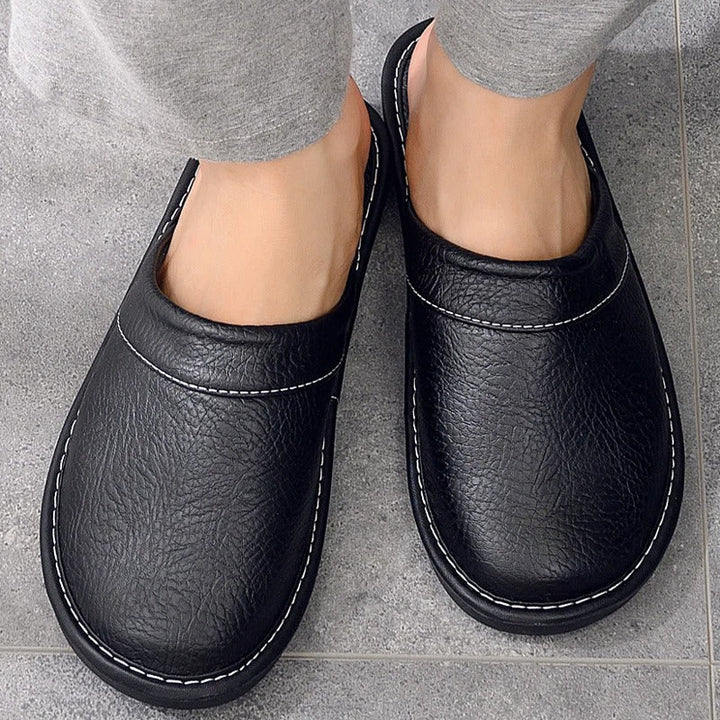 Robuste Lederpantoffeln für Damen und Herren, elegant und langlebig, in Blau, Braun, Orange, Rosa, Rot und Schwarz.