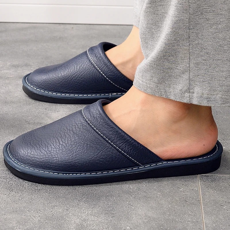 Robuste Lederpantoffeln für Damen und Herren, elegant und langlebig, in Blau, Braun, Orange, Rosa, Rot und Schwarz.