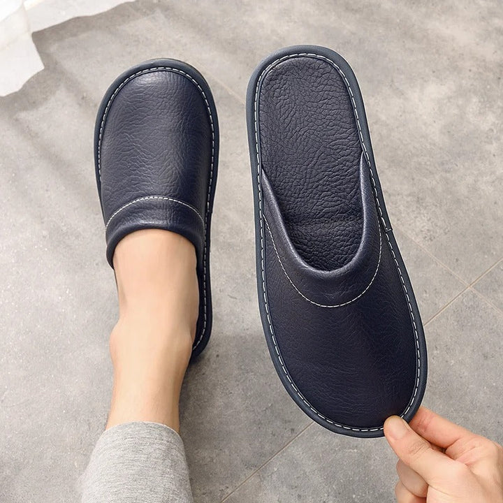 Robuste Lederpantoffeln für Damen und Herren, elegant und langlebig, in Blau, Braun, Orange, Rosa, Rot und Schwarz.