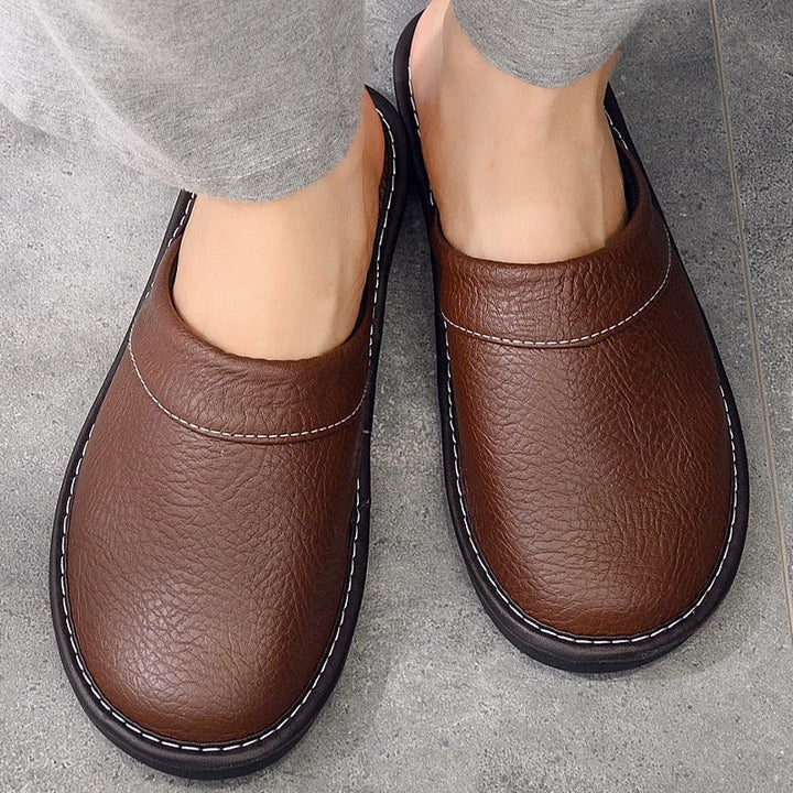 Robuste Lederpantoffeln für Damen und Herren, elegant und langlebig, in Blau, Braun, Orange, Rosa, Rot und Schwarz.