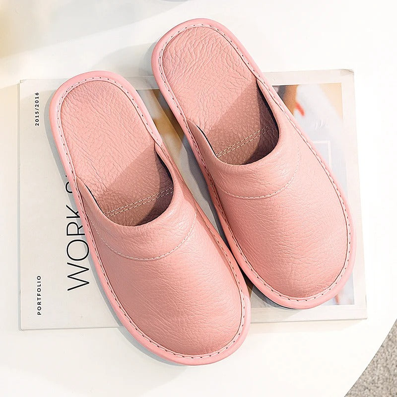 Robuste Lederpantoffeln für Damen und Herren, elegant und langlebig, in Blau, Braun, Orange, Rosa, Rot und Schwarz.